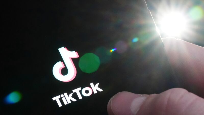 The TikTok startup page is displayed on an iPhone in Ottawa, Ontario, Monday, Feb. 27, 2023.