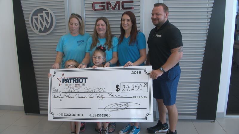 Patriot Chevy in Ardmore donated thousands of dollars to a local school for children with autism.